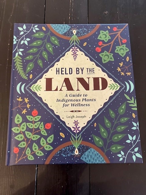 BOOK Held by Land-